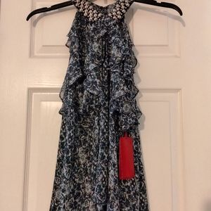 Jennifer Lopez flowy top with studded collar